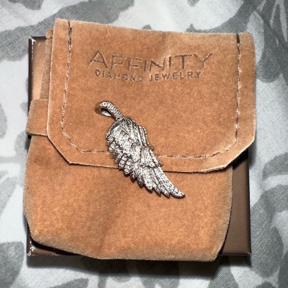 Diamond accent angel wing pendant